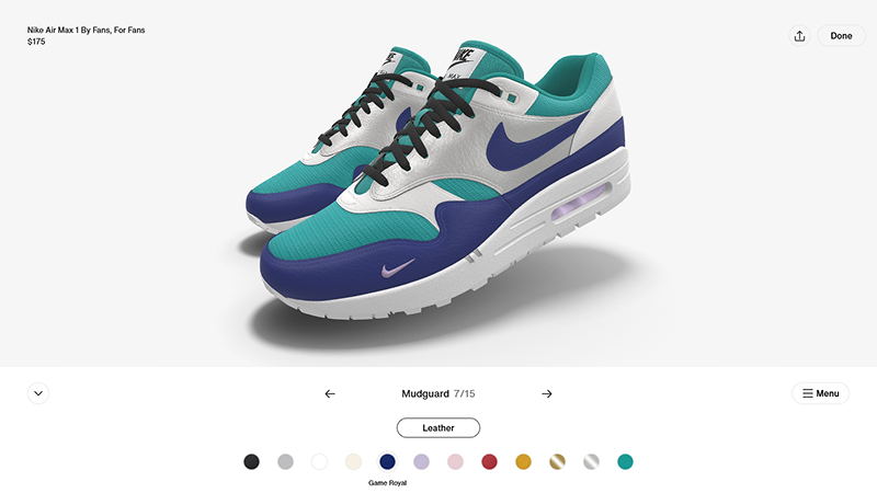 Nike By You 3D shoe customizer displaying both sneakers with customizable colors and materials.